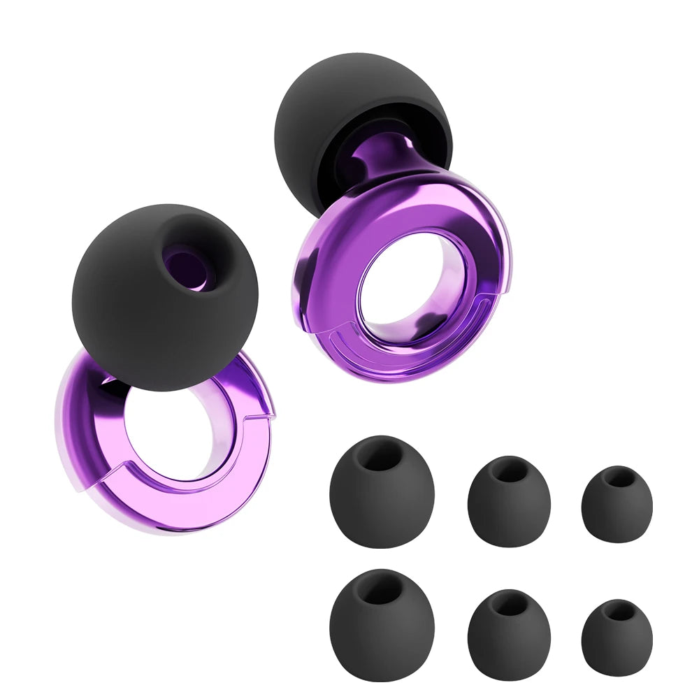 Purple ear gauges with black silicone tips on a white background
