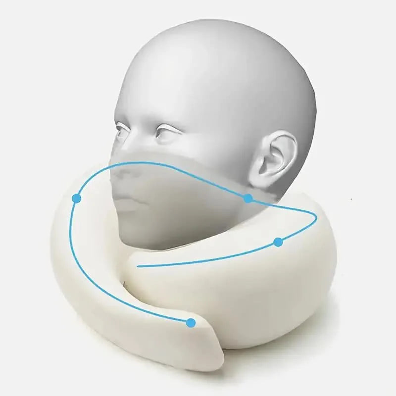 Neck pillow with a mannequin head on a white background