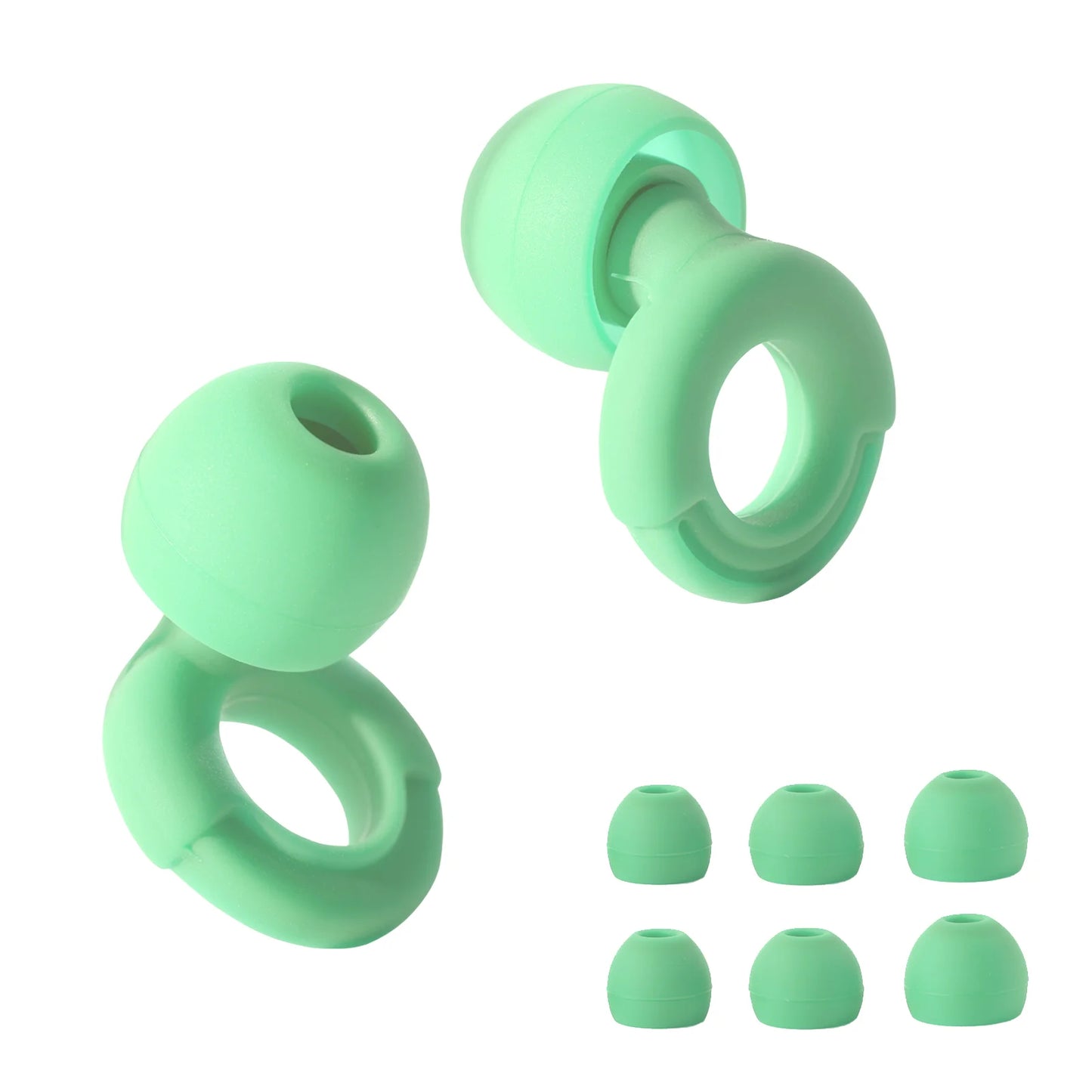 Set of green silicone earbud tips on a white background