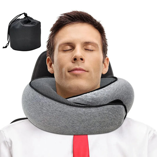 Man using a gray neck pillow with a carrying case on a white background