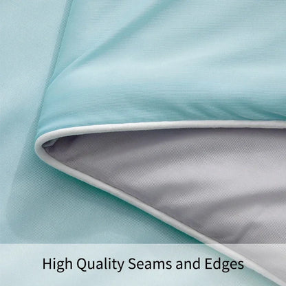 Close-up of fabric with high-quality seams and edges on a light blue background