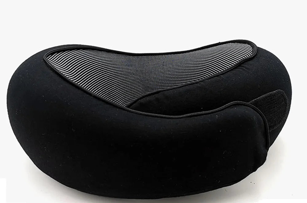 Black neck pillow with a carrying pouch on a white background