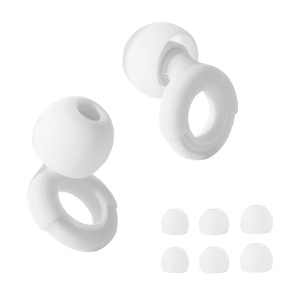Set of white silicone earbud tips on a white background