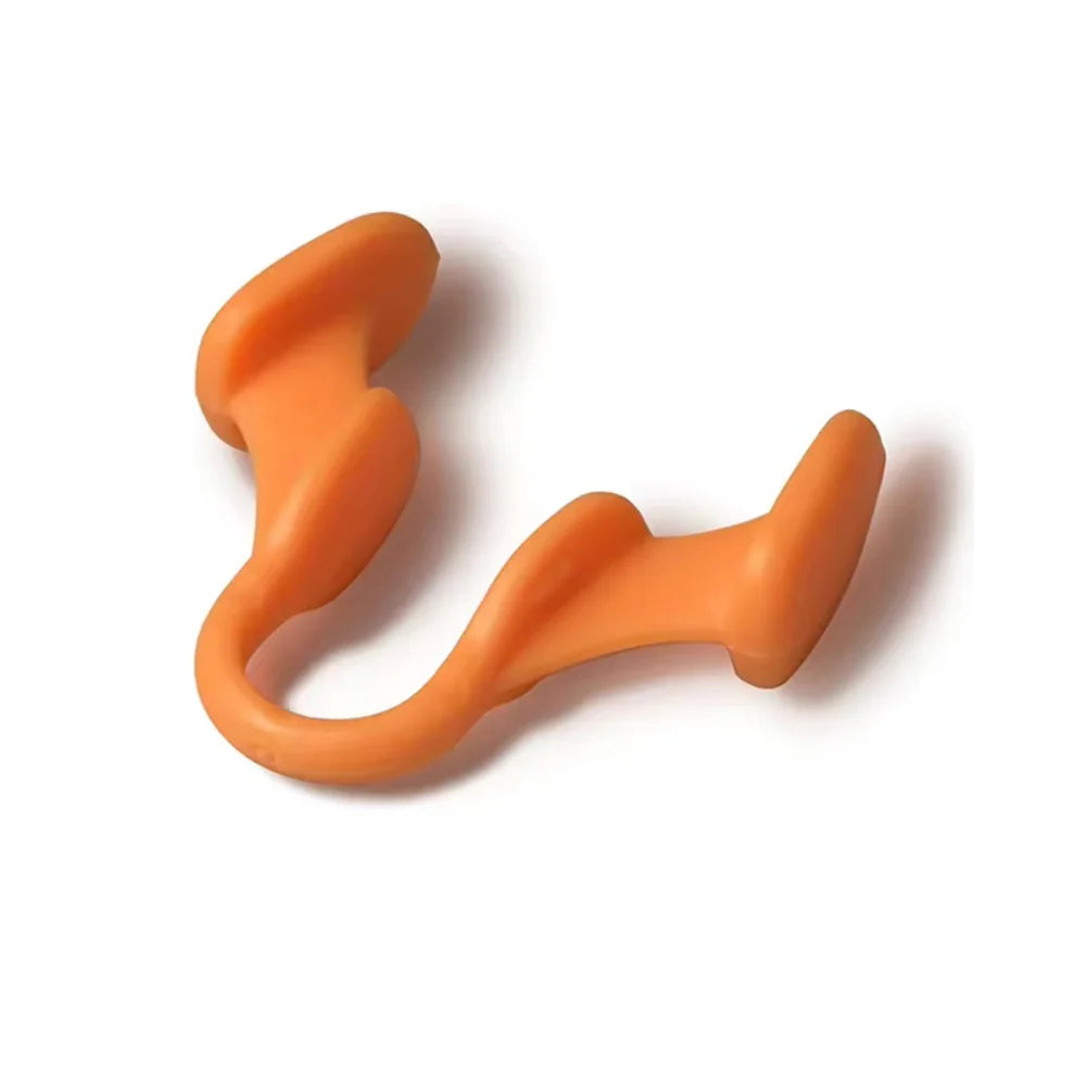 orange nasal dilator on a white background